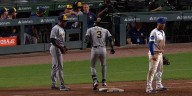 Joey Ortiz exits Brewers game after fouling ball off right knee