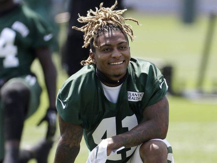 Ex-NFL star arrested in fraud case after year as fugitive