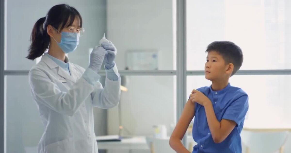 Pediatric group breaks with CDC over COVID vaccines. What's that mean for kids?