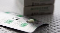 Texas woman sues Marine, claiming he spiked her drink with abortion pills