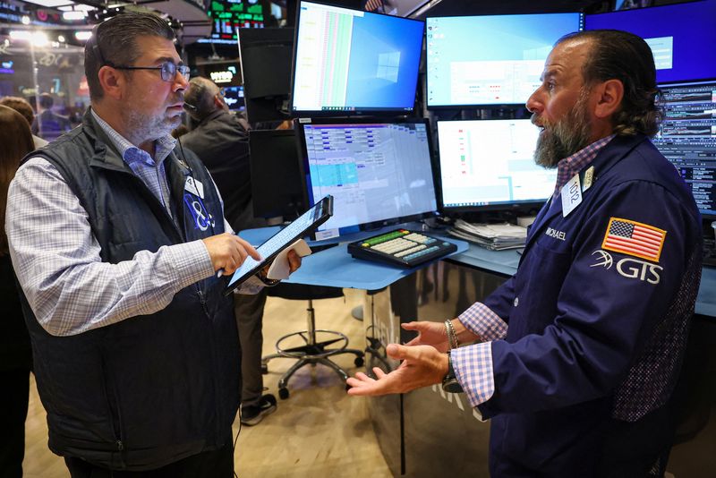 Wall St futures subdued ahead of retail earnings, Fed commentary