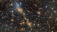 Scientists capture bridge of stray stars being sucked from one galaxy to another