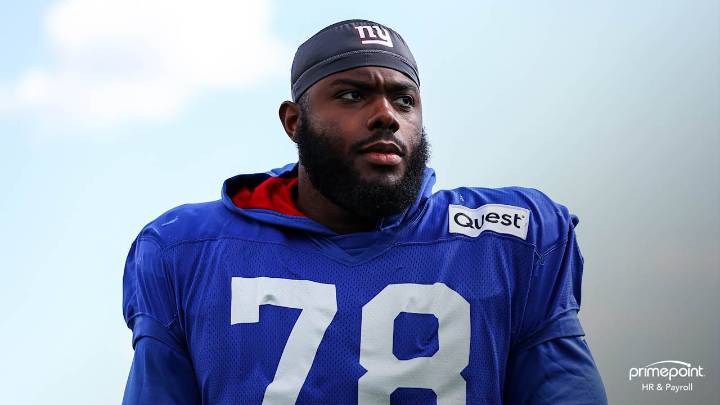 Andrew Thomas passes physical, returns to practice