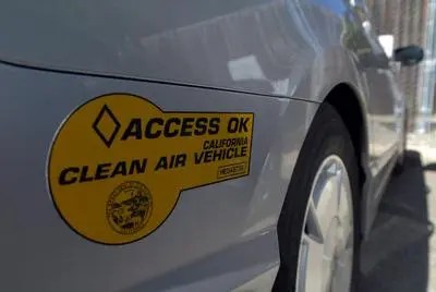 Driving solo in a carpool lane with a HOV sticker could soon be illegal