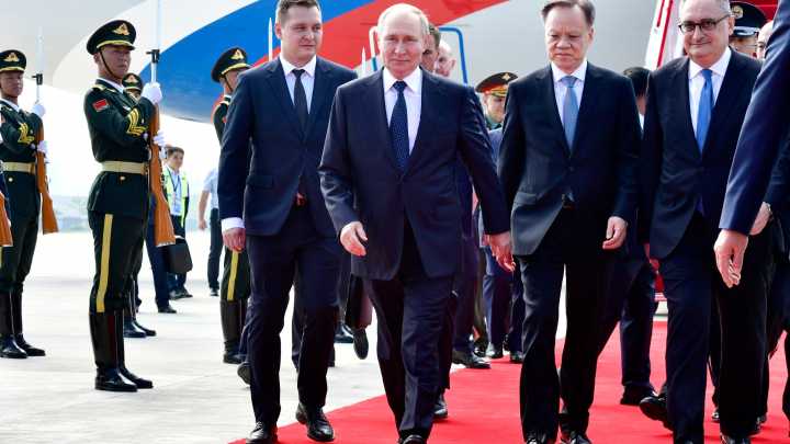 Putin has red carpet arrival in China ahead of 'Axis of Evil' meeting with Xi & Kim