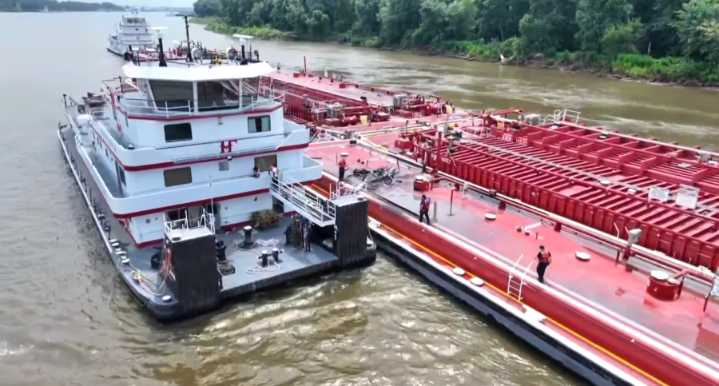 Helicopter crashes into Mississippi River barge north of St. Louis