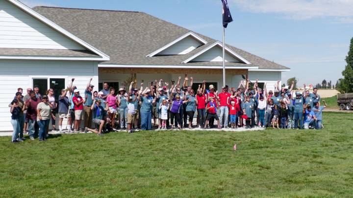 Volunteers help landscape a medically retired veteran’s new home