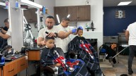 Camden barbershop gives out school supplies, free haircuts to kids