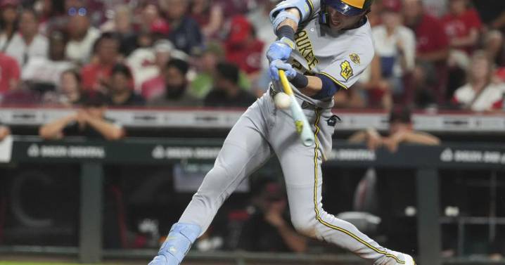 Yelich hits 2 HRs as MLB-best Brewers rally past Reds 10-8, tie club record with 13th straight win