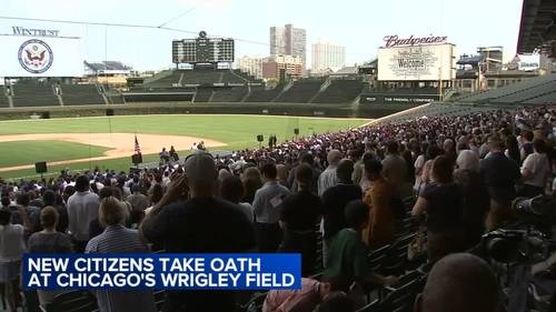 Nearly 1,000 from over 100 countries become American citizens in Chicago Wrigley Field naturalization ceremony
