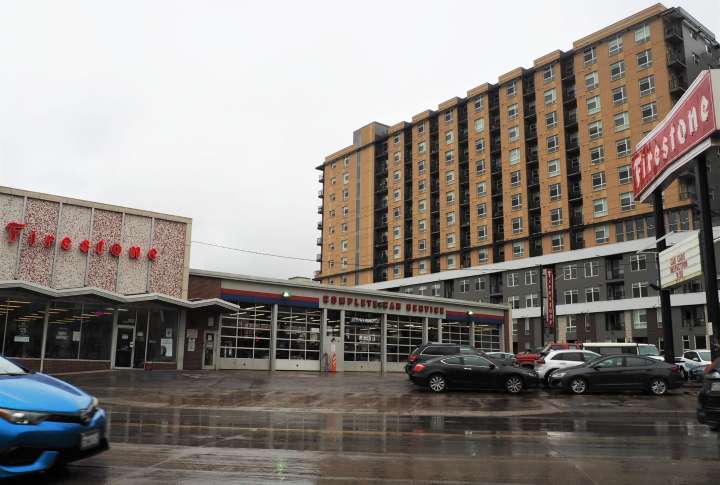 Tire shop returning to downtown site as developer sells at a loss