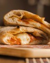 Pizza Lovers Are Raving About Albano's Massive Pizza Puff