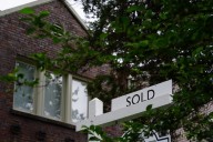 Home sales went up in July, offering momentum to a struggling market