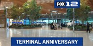 Travelers celebrate first anniversary of newly-renovated PDX main terminal
