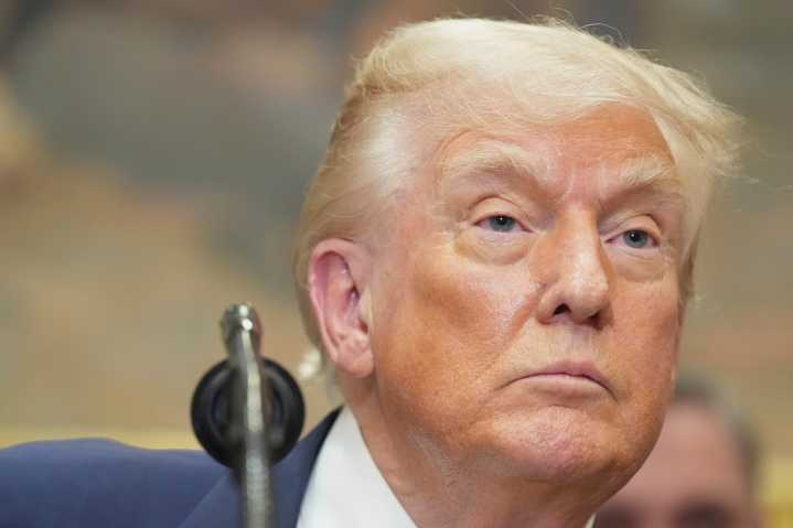 Trump hits Canada with 35 per cent tariffs