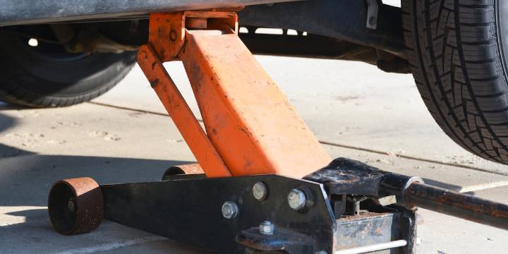 Man killed when vehicle slips from car jack, crushes him, police say