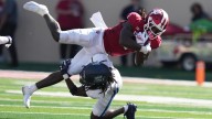 Mendoza leads Indiana to a 27-14 win over Old Dominion