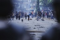 Riot police clash with students protesting lawmakers’ allowances in Indonesia