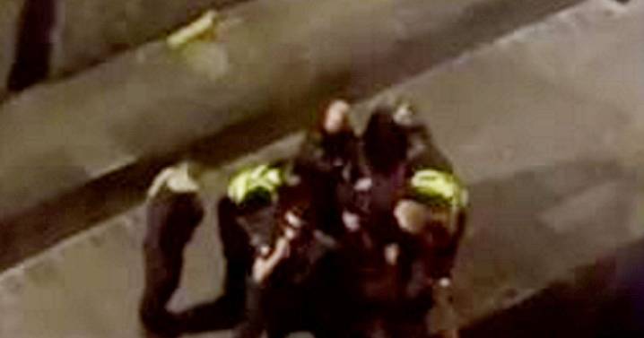 Moment officers pull NAKED man from Manchester canal