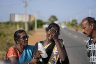 A wartime mass grave in Sri Lanka yields a baby bottle, children's clothes and 141 skeletons