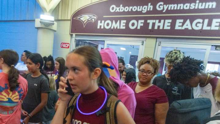See photos of the cancellation of Bell vs. Oak Hall high school footballl
