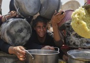 Baby girl killed with parents in Gaza airstrike as Israelis urge a mass protest over the war