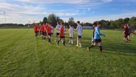 Leslie scores late to beat Manchester