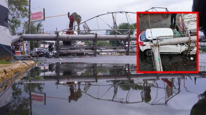Reportan caída de espectacular por fuertes lluvias en Tlalnepantla; no hay lesionados