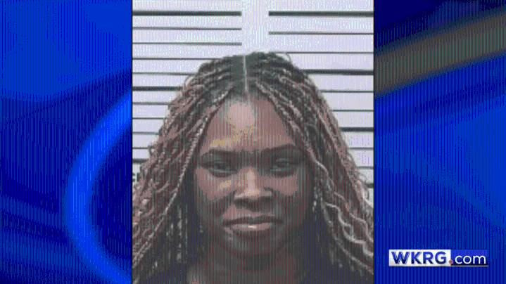 Mobile woman arrested after shooting into vehicle, police say