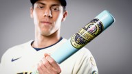 Christian Yelich homers honors using Bob Uecker bat