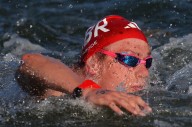 Olympic swimmers to take on length of Thames in sewage protest