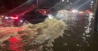 Tidal flooding from Hurricane Erin causing problems for cars in Norfolk