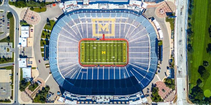 Punishments announced for Michigan football program for sign