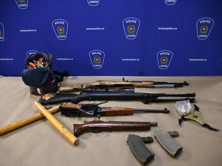 London man, woman charged as police seize rifles, prohibited weapons