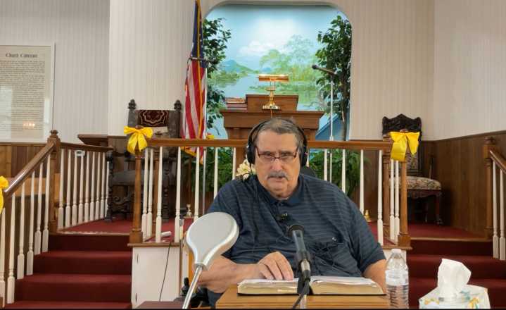 Pastor makes defiant return after church shooting