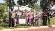 A dozen people gathered in Gainesville to protest Alligator Alcatraz