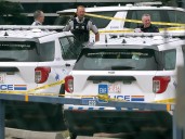 Man shot by police at Strathcona RCMP detachment now faces charges