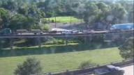 TEAM 2 TRAFFIC: Stalled 18-wheeler on I-10 Eastbound stacks traffic across the bridge