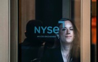 Wall Street ends lower ahead of inflation report, China trade talks