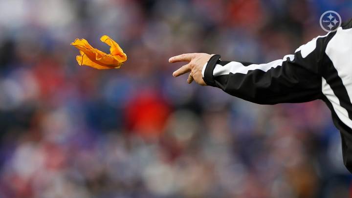 Picking up flags the goal, not throwing them