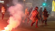 Serbia protests over government turn violent as rival groups clash