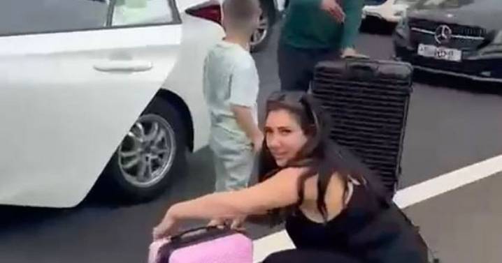 Desperate family seen ditching car and walking along hard shoulder to get Greece flight
