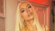 Swimsuit-clad Christina Aguilera highlights weight loss transformation in stunning poolside photos
