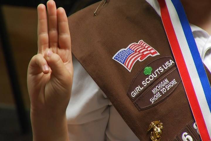 Girl Scouts celebrate new Little Library installation on Boardman Lake Trail