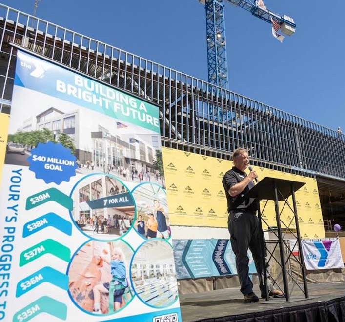 Community can’t be spelled without the Y: Nonprofit celebrates next phase of project with topping