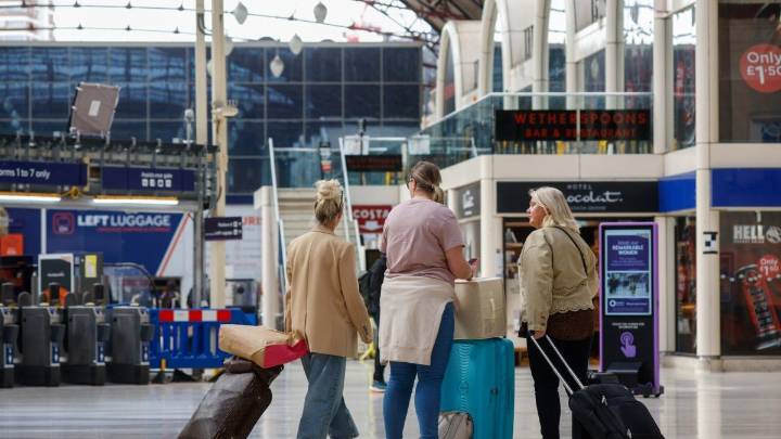 Two-hour queues and 'do not travel' warning as strikes hit bank holiday travel