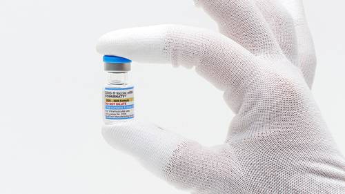 FDA approves updated COVID-19 shots, but limits access for some