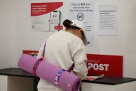 Factbox-Global postal services suspend some U.S. shipments as de minimis exemption ends