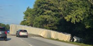 Car, semi-truck crash shuts down lane of I