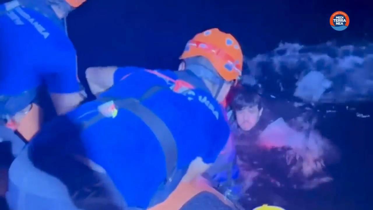 NGO rescues 10 migrants off Libyan coast they say were thrown into sea by militiamen